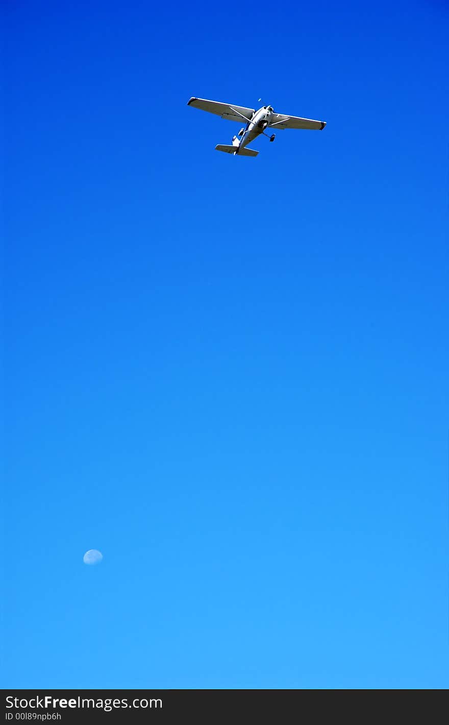 The moon and a plane