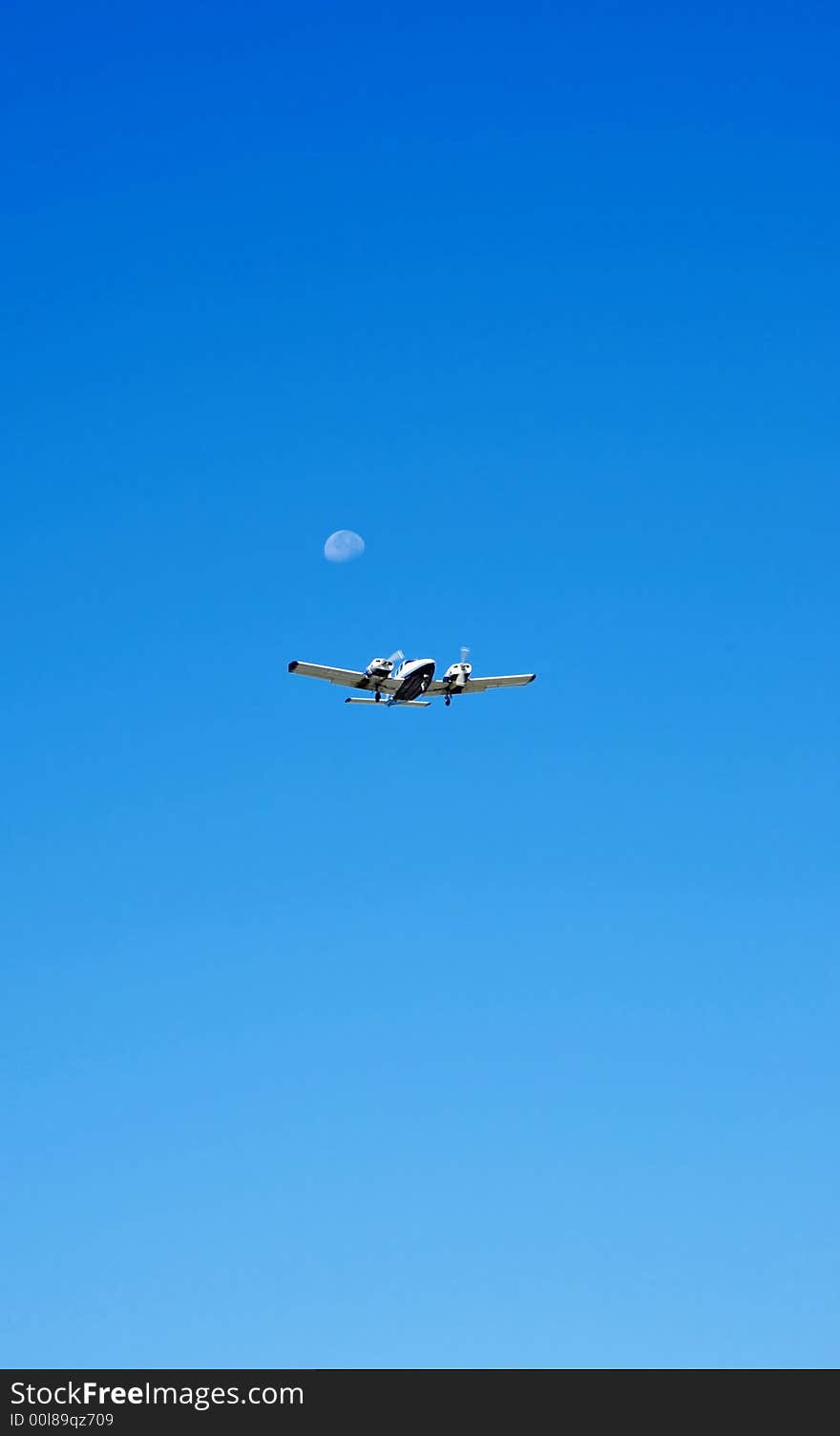 The moon and a plane