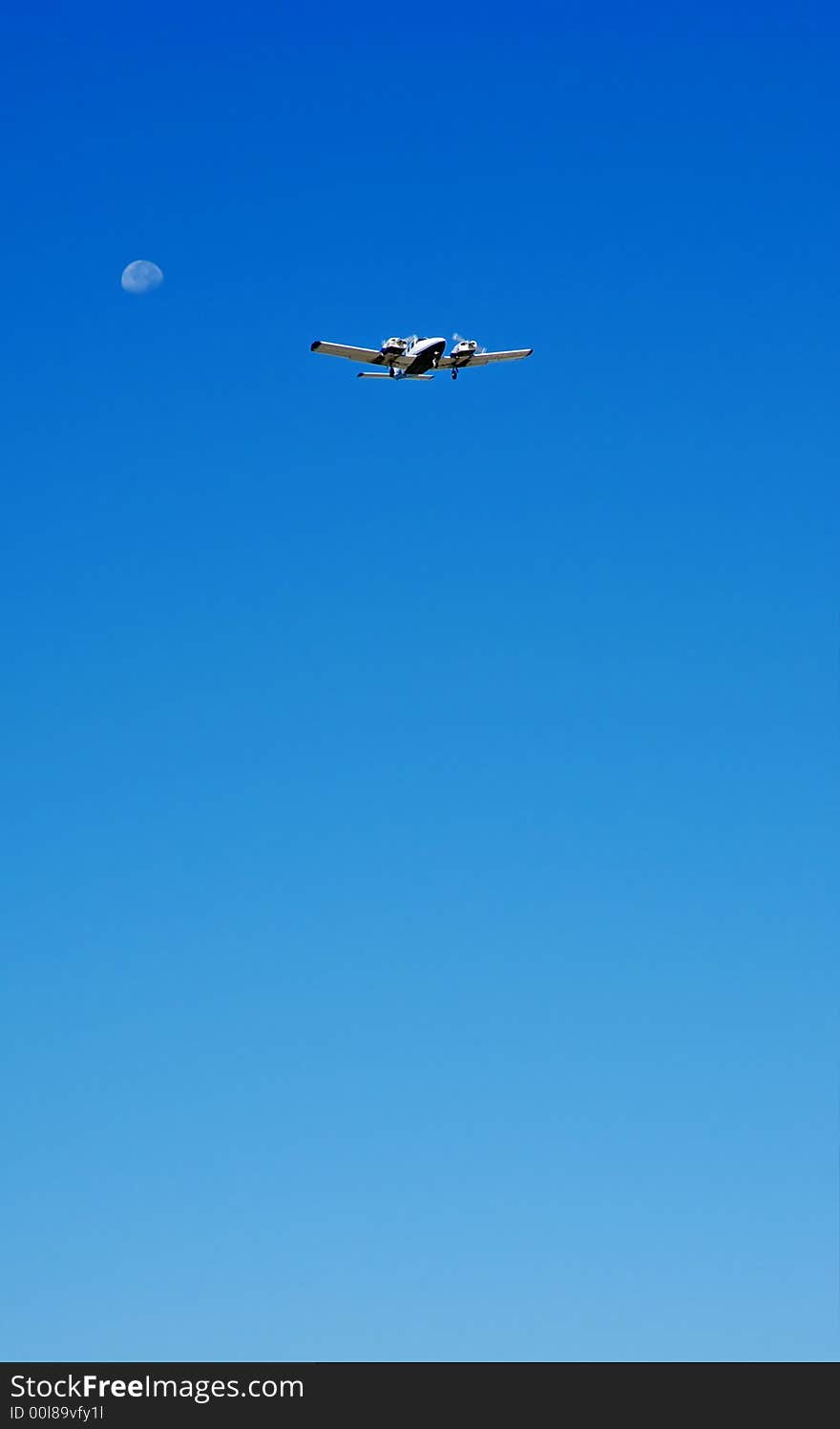 The moon and a plane