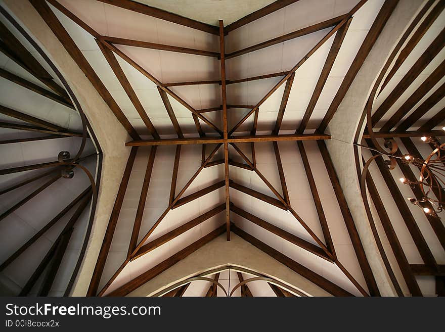 Ceiling of a chapel, chandelier also visible. Ceiling of a chapel, chandelier also visible