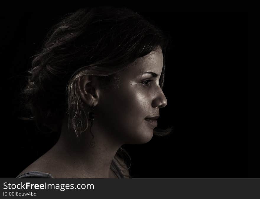 Portrait of Woman profile on dark background. Portrait of Woman profile on dark background