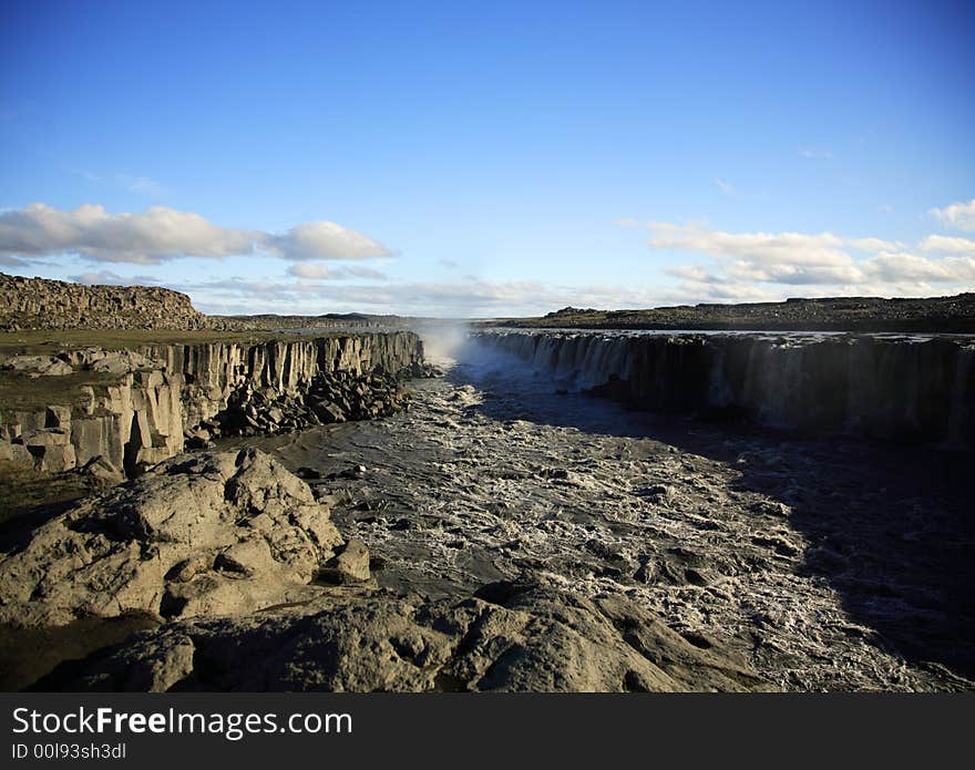 View across the powerful Dettifoss waterfall. View across the powerful Dettifoss waterfall