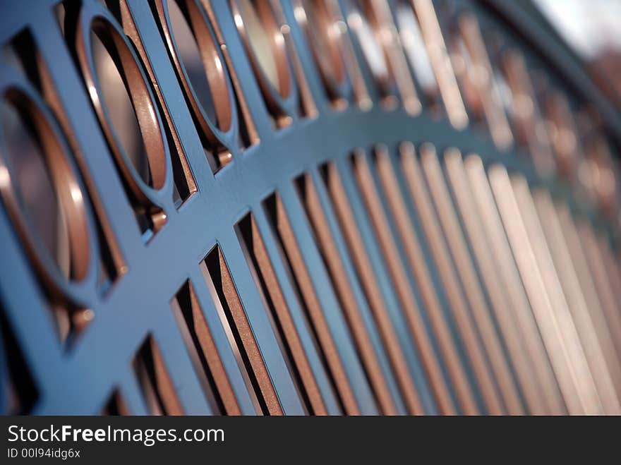 A closeup of part of metal bench. A closeup of part of metal bench.