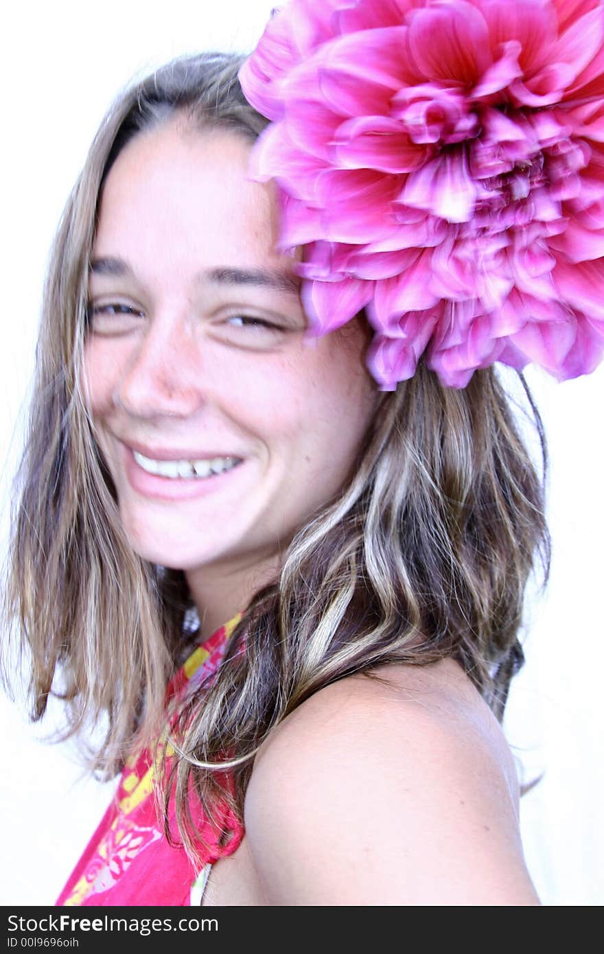 Young woman with flower in hair