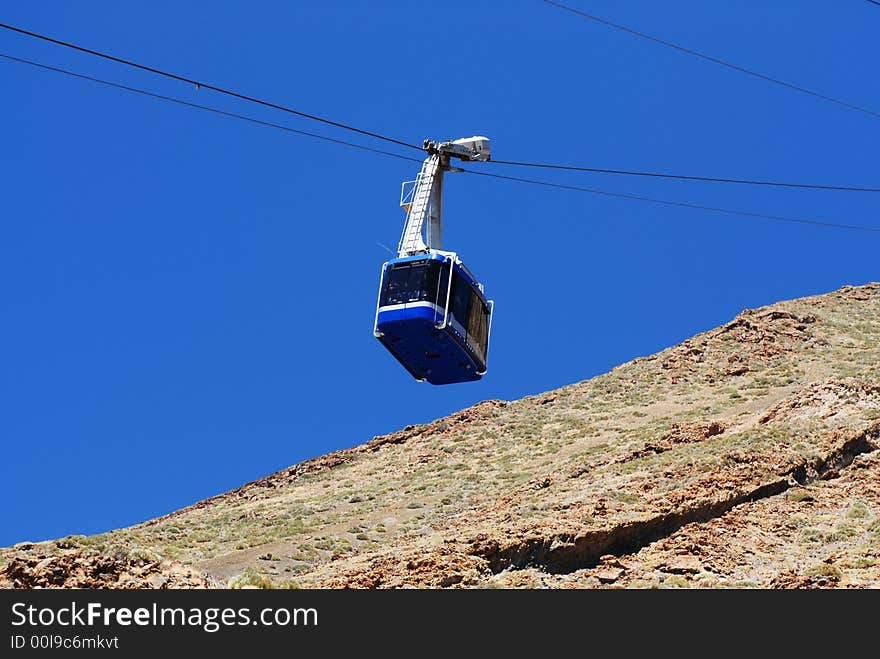 Rope-way cabine goes to the top station. Rope-way cabine goes to the top station