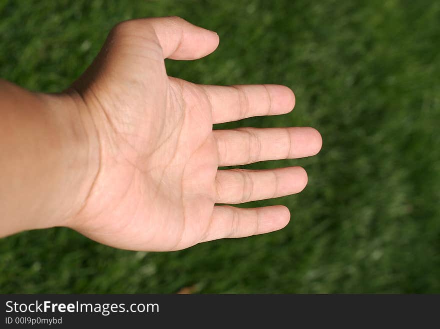 Man's fist on a blurred background. Man's fist on a blurred background