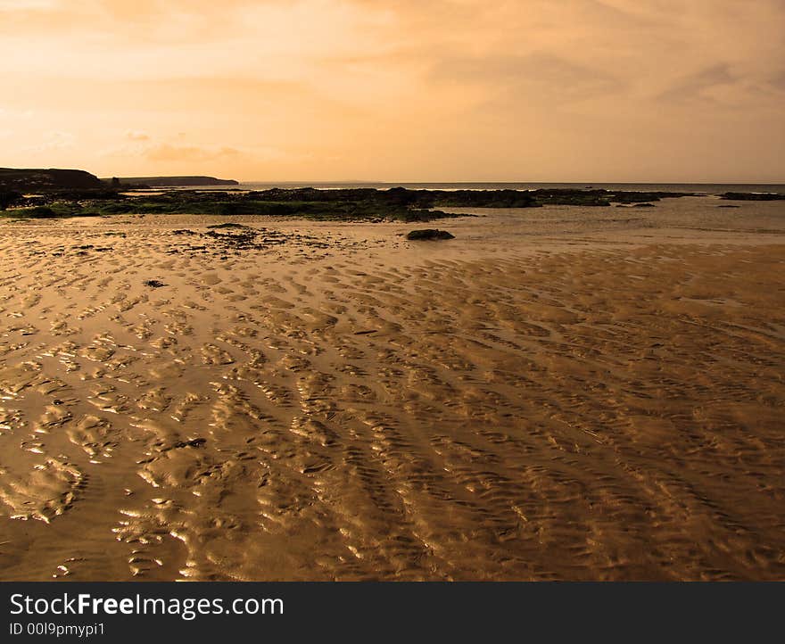 Looking along beach –  Constantine Bay, Cornwall, England