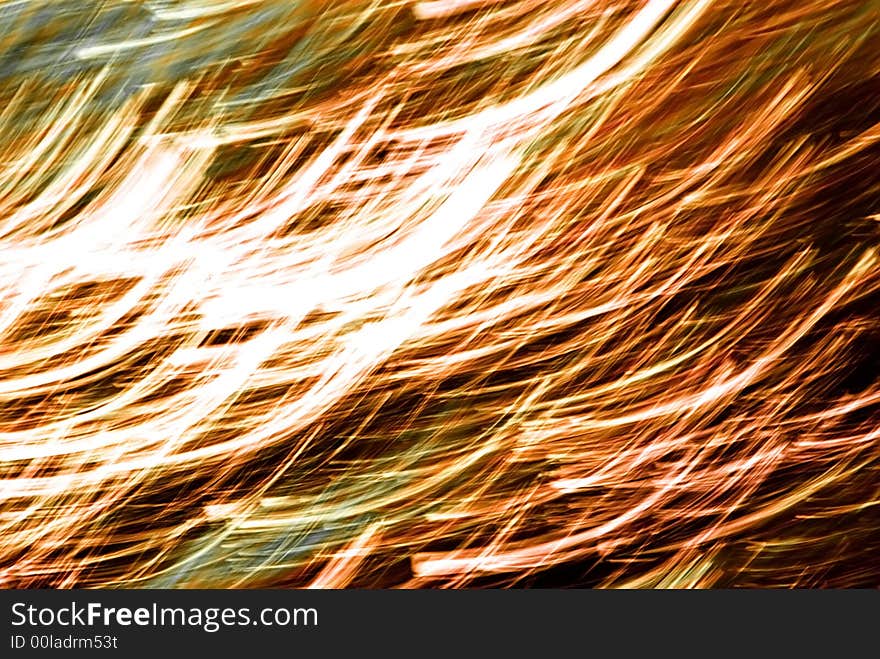 An abstract image created by using a slow shutter speed while moving and/or adjusting the focal length of the lens.  Colors added and/or adjusted afterwards. An abstract image created by using a slow shutter speed while moving and/or adjusting the focal length of the lens.  Colors added and/or adjusted afterwards.