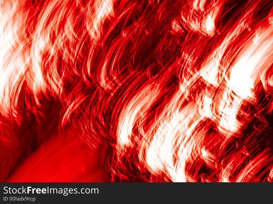 An abstract image created by using a slow shutter speed while moving and/or adjusting the focal length of the lens.  Colors added and/or adjusted afterwards. An abstract image created by using a slow shutter speed while moving and/or adjusting the focal length of the lens.  Colors added and/or adjusted afterwards.