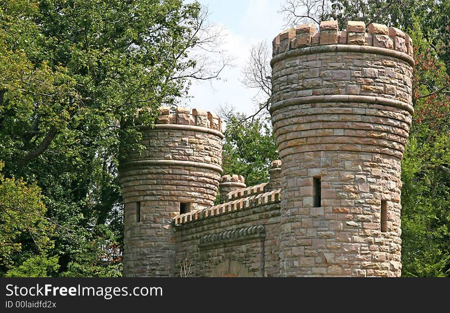 Stone gates and turrets on an old castle. Stone gates and turrets on an old castle