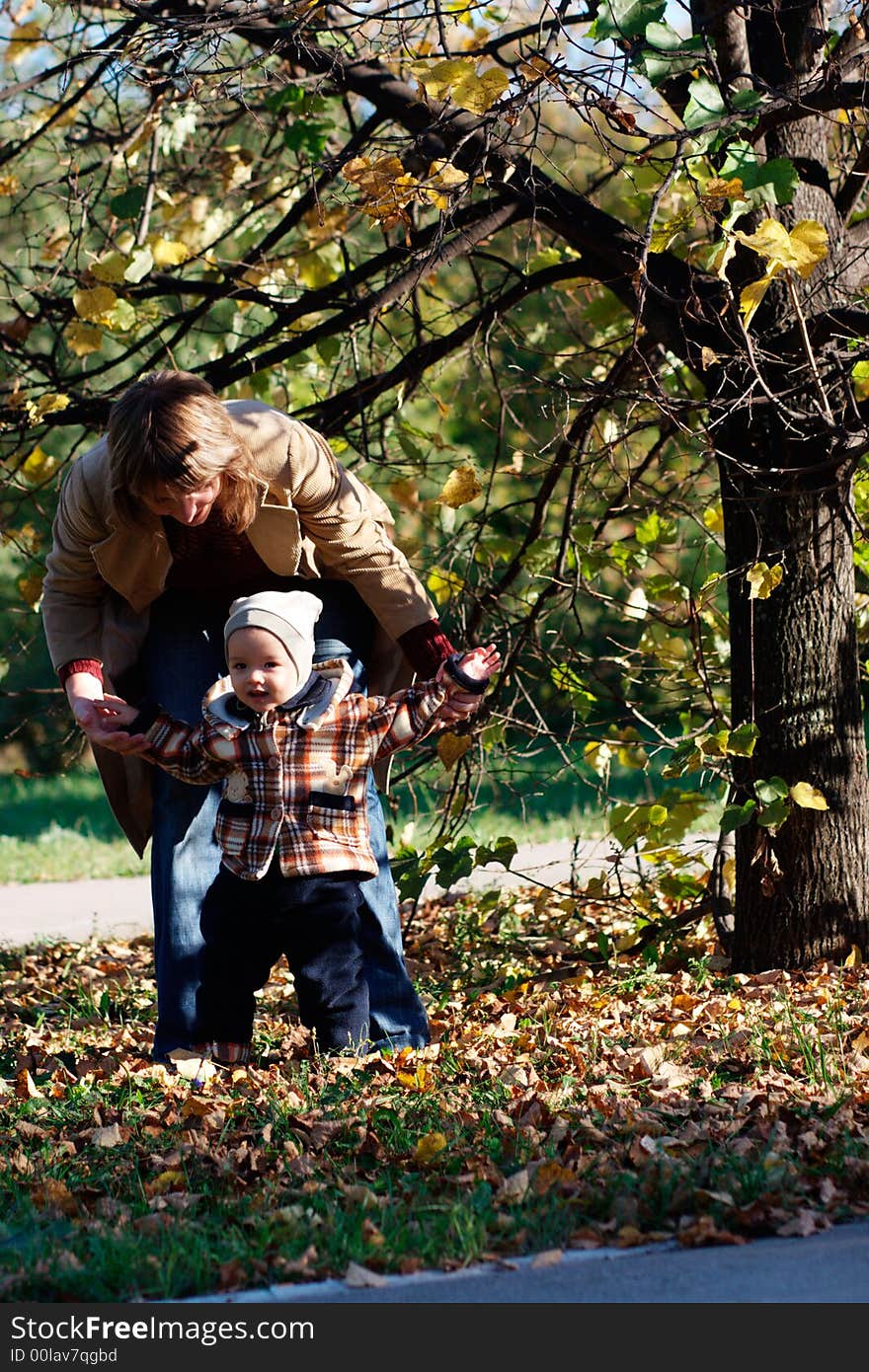 Little boy and his mother in park. Little boy and his mother in park