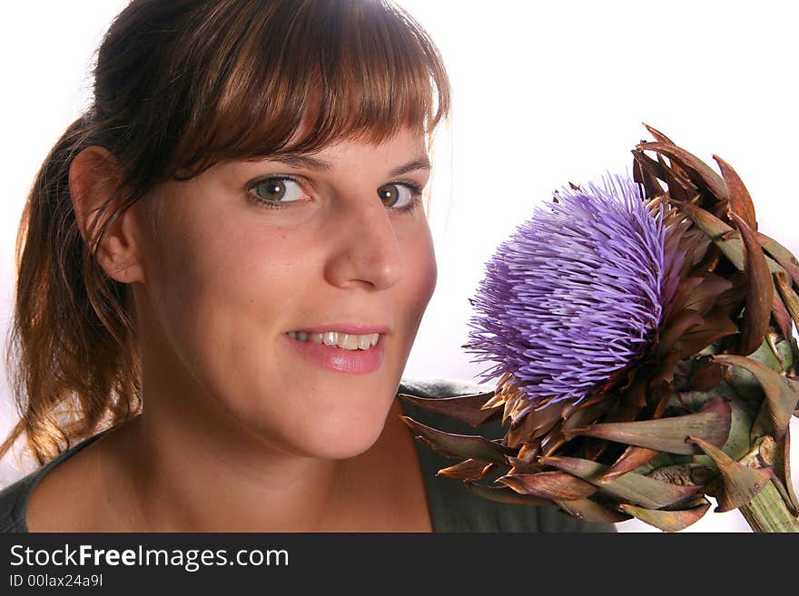 A young woman with a beautiful flower!. A young woman with a beautiful flower!