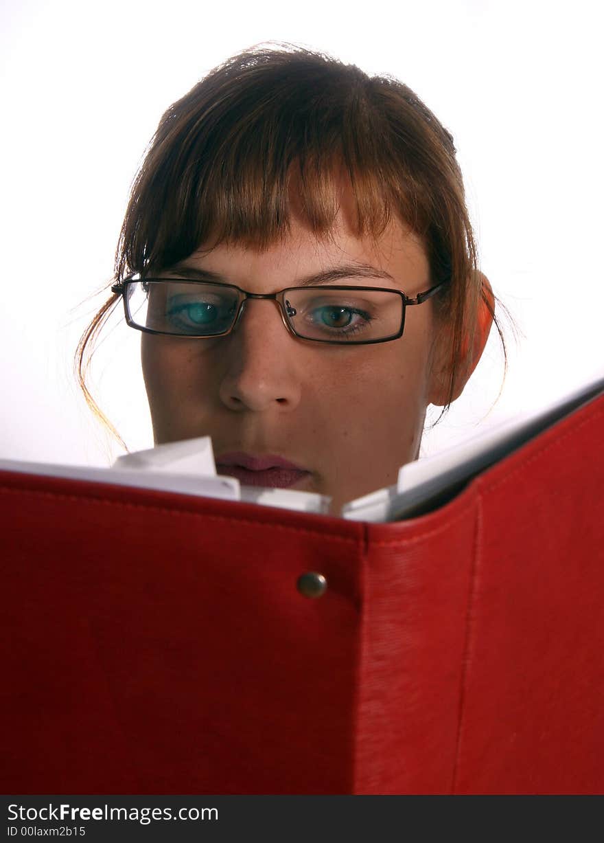 A young student is reading a book. A young student is reading a book.