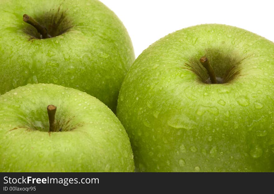 Fresh green apples on white background