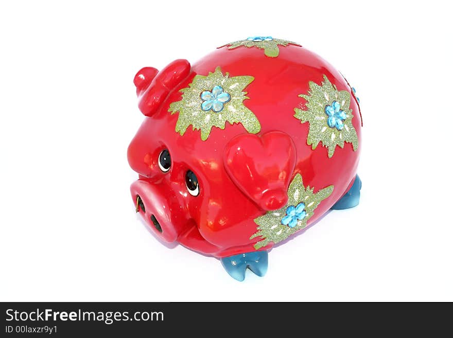 Red piggy bank isolated on the white.