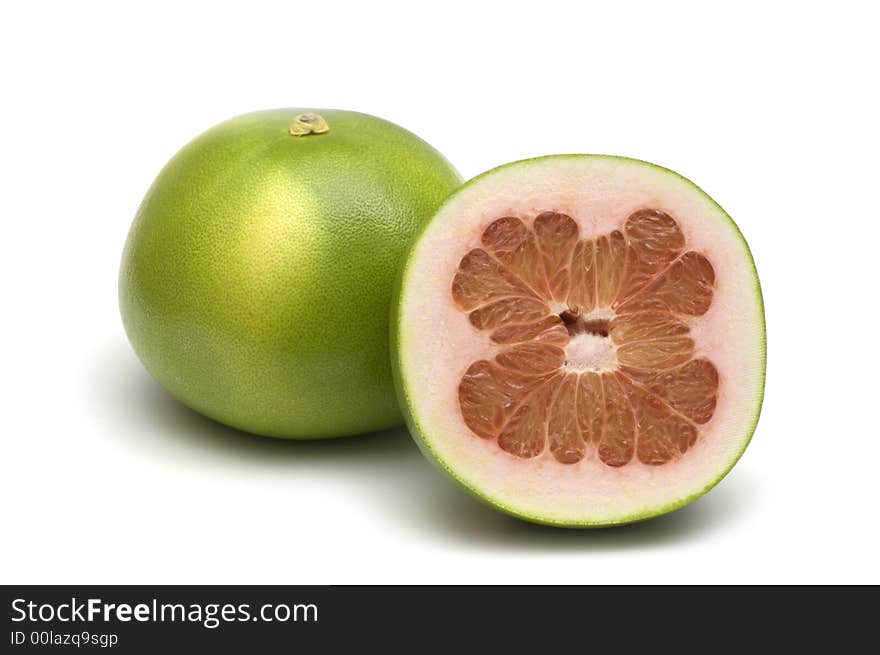 Two fresh pomelo on white