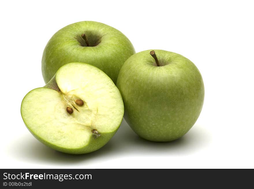 Fresh green apples on white background