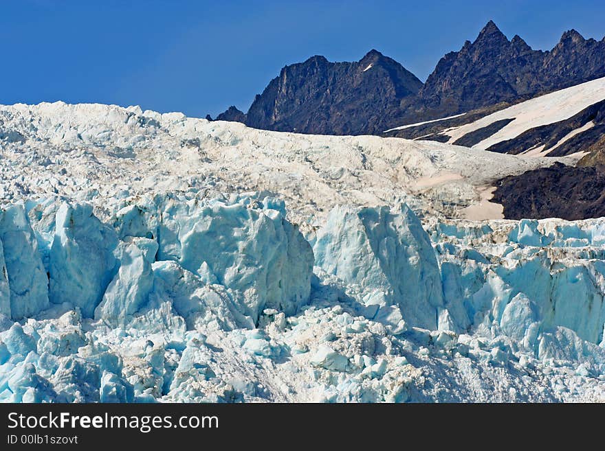 Glacier with snow field in Alaska. Glacier with snow field in Alaska.