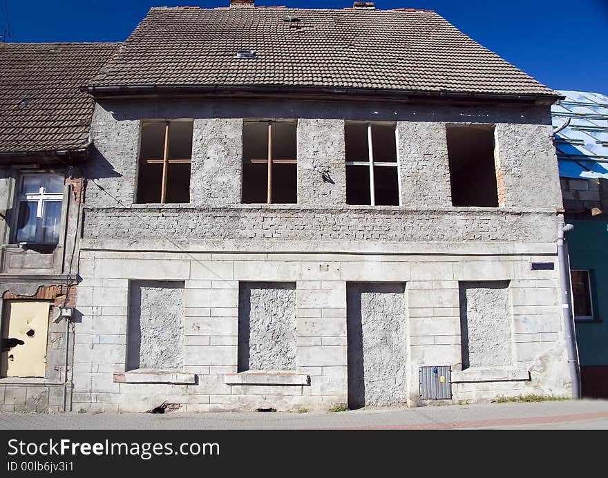 A house with its door and windows filled with concrete, abandoned. <a href=' STYLE='font-size:13px; text-decoration: blink; color:#FF0000'><b>MORE PHOTOS OF POLAND »</b></a>. A house with its door and windows filled with concrete, abandoned. <a href=' STYLE='font-size:13px; text-decoration: blink; color:#FF0000'><b>MORE PHOTOS OF POLAND »</b></a>