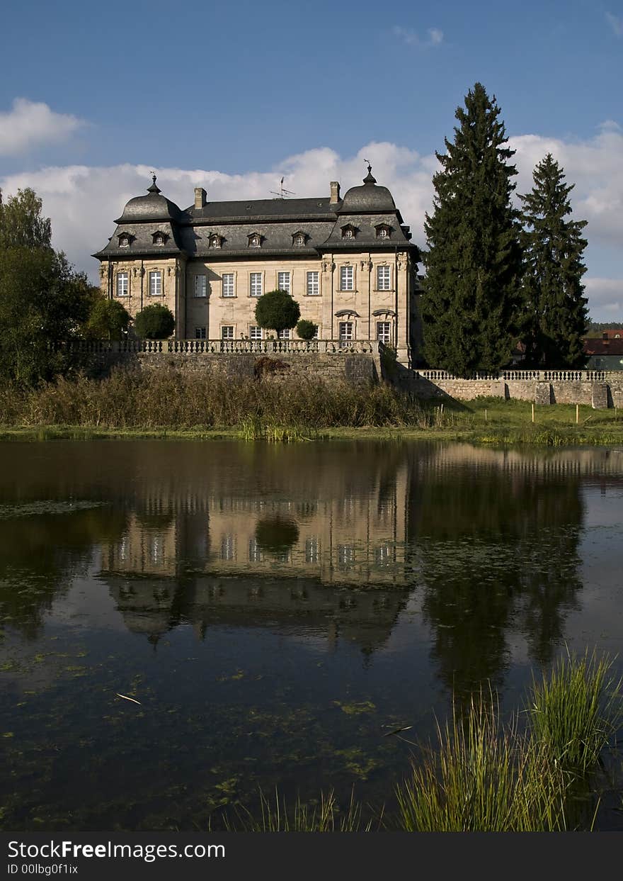 German baroque castle ar a pond. German baroque castle ar a pond