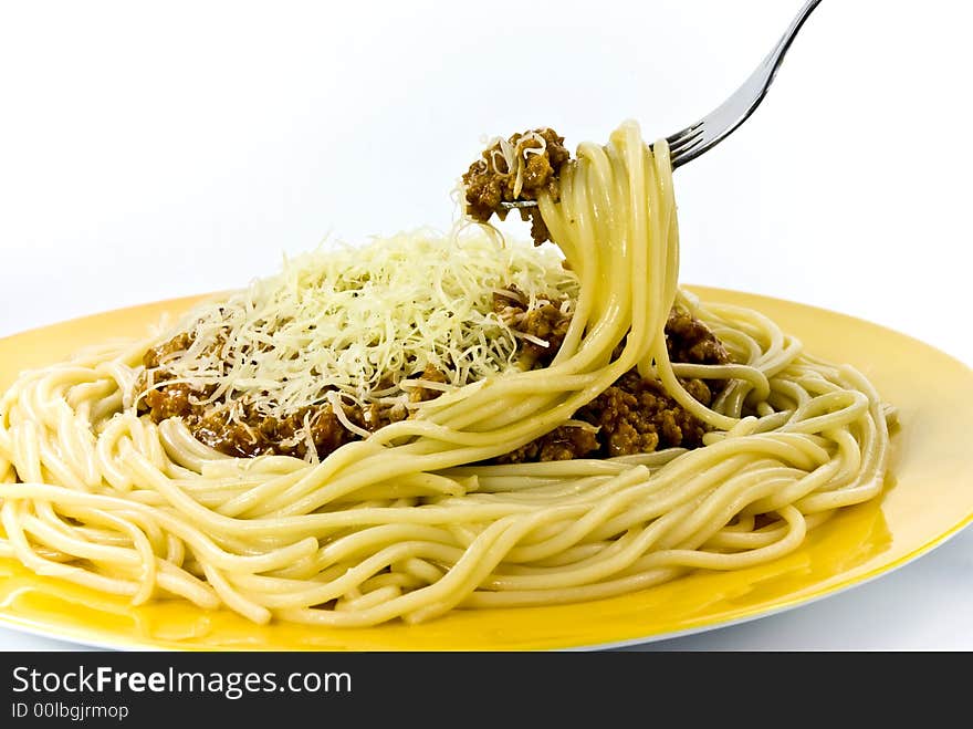 Plate of spaghetti with parmesan cheese.