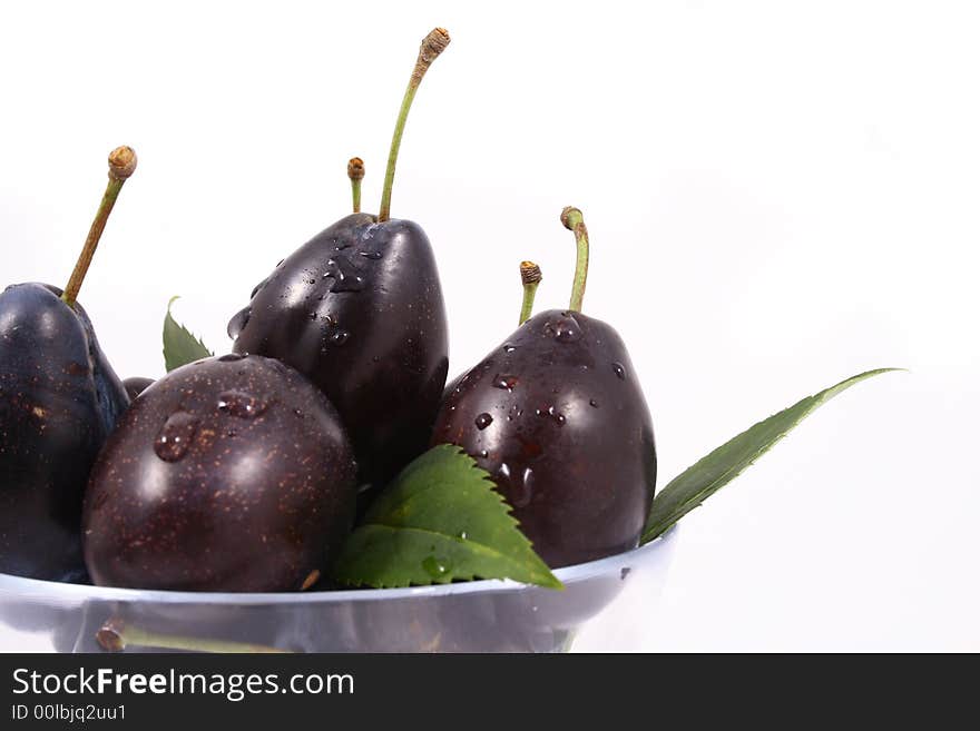 Violet Plumbs isolated on white background-fruits