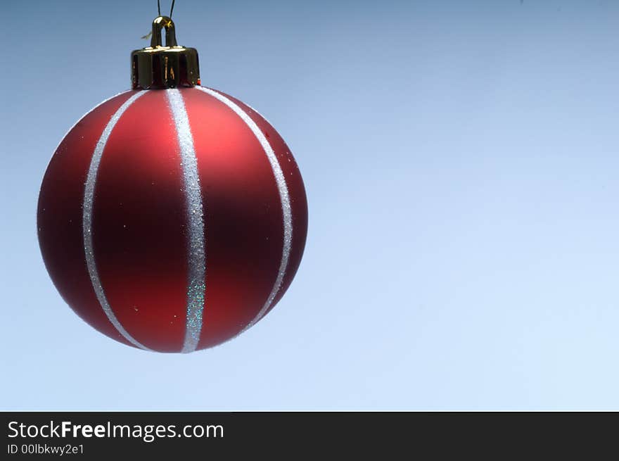 Christmas tree decoration ball on bluebackground. Christmas tree decoration ball on bluebackground.