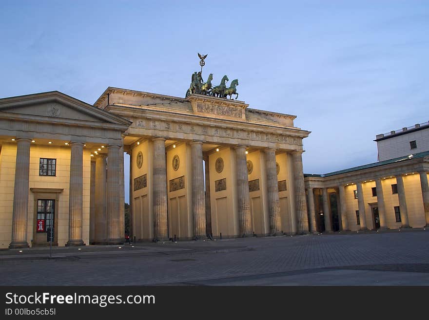 Brandenburg Gate in Berlin in the early morning in Autumn. Brandenburg Gate in Berlin in the early morning in Autumn