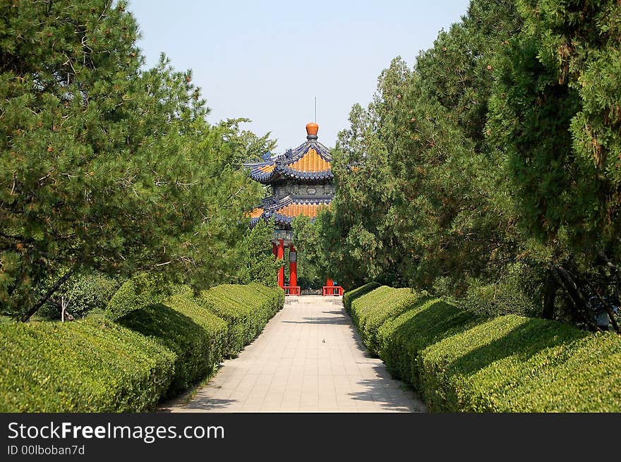 A beautiful pavilion standing among green trees, shot at chinese rose garden in the temple of heaven park. A beautiful pavilion standing among green trees, shot at chinese rose garden in the temple of heaven park.