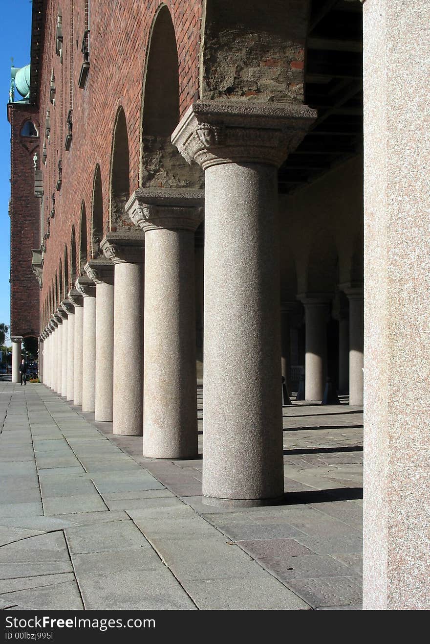 Pillars at an entrance to a giant beautiful building. Pillars at an entrance to a giant beautiful building