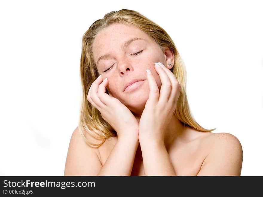 Blond woman in the studio on a white background doing the welness shoot. Blond woman in the studio on a white background doing the welness shoot