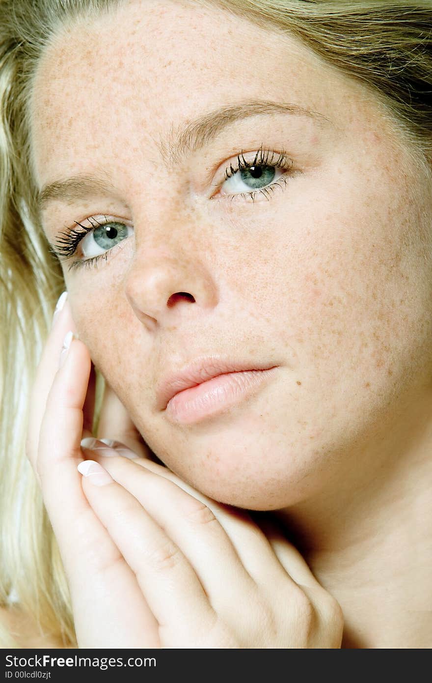 Blond woman in the studio on a white background doing the welness shoot. Blond woman in the studio on a white background doing the welness shoot