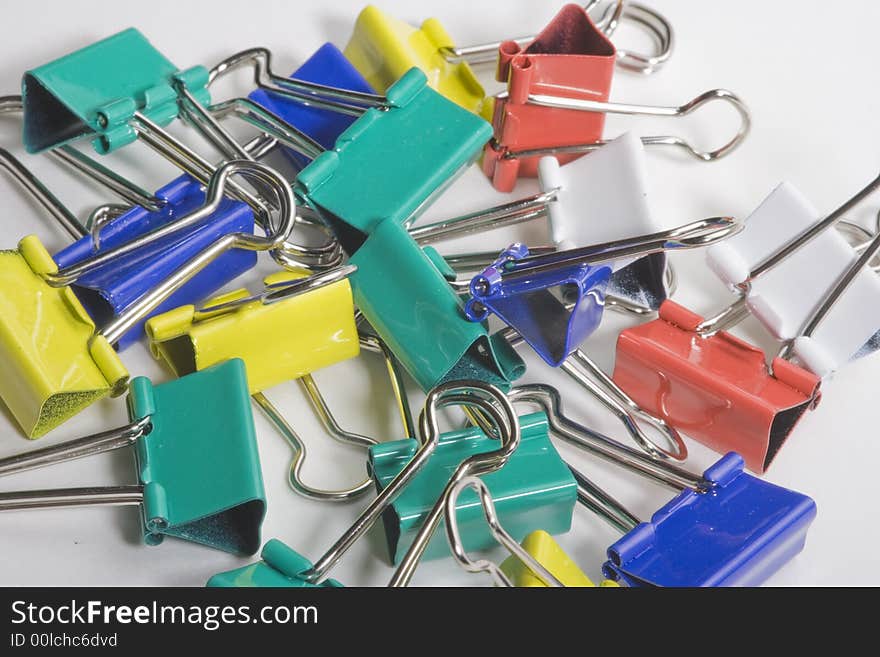 Assorted colored steel paper clips.