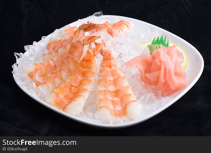 Shrimp in ice (isolated in black)