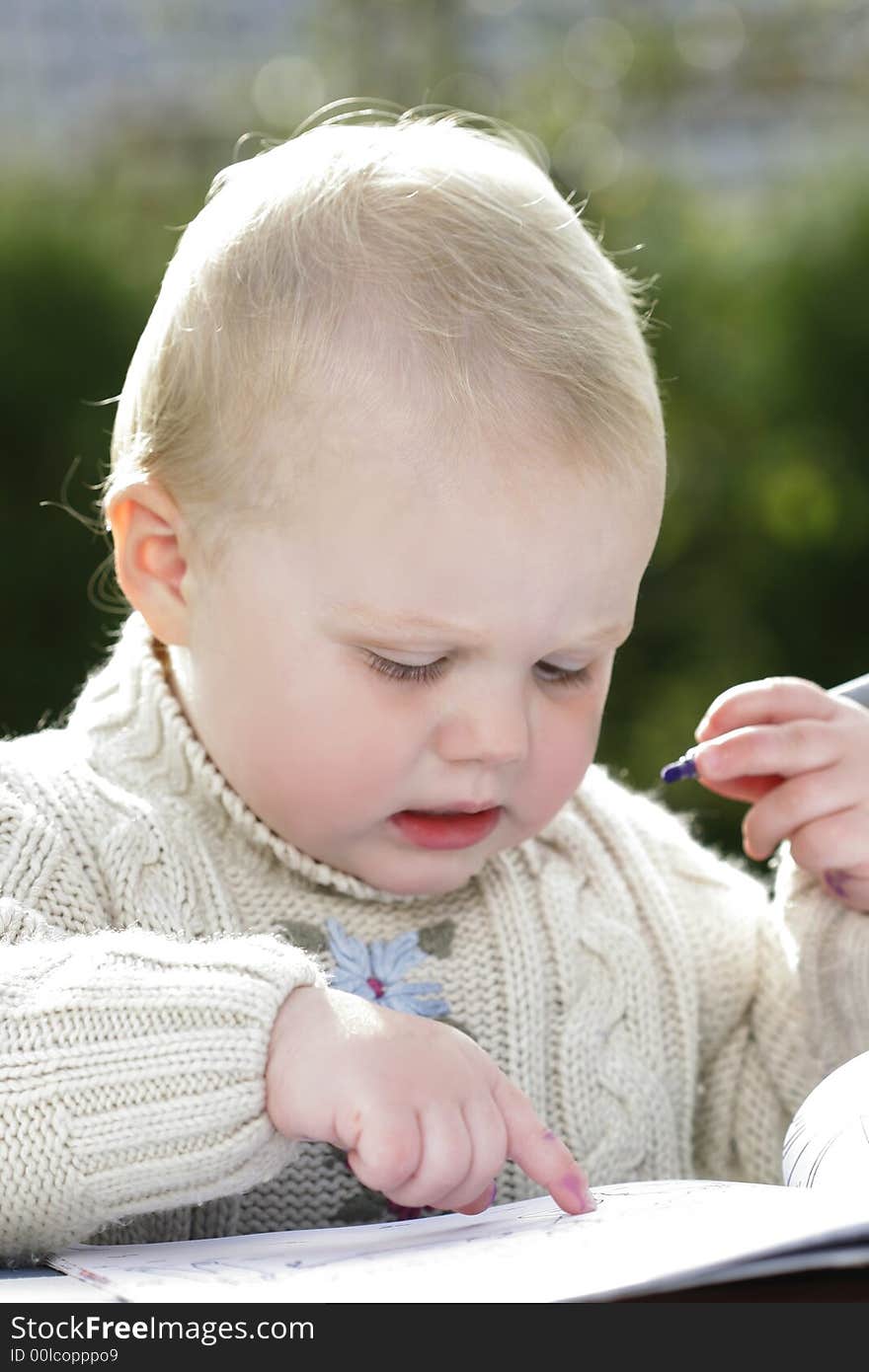 Toddler is painting