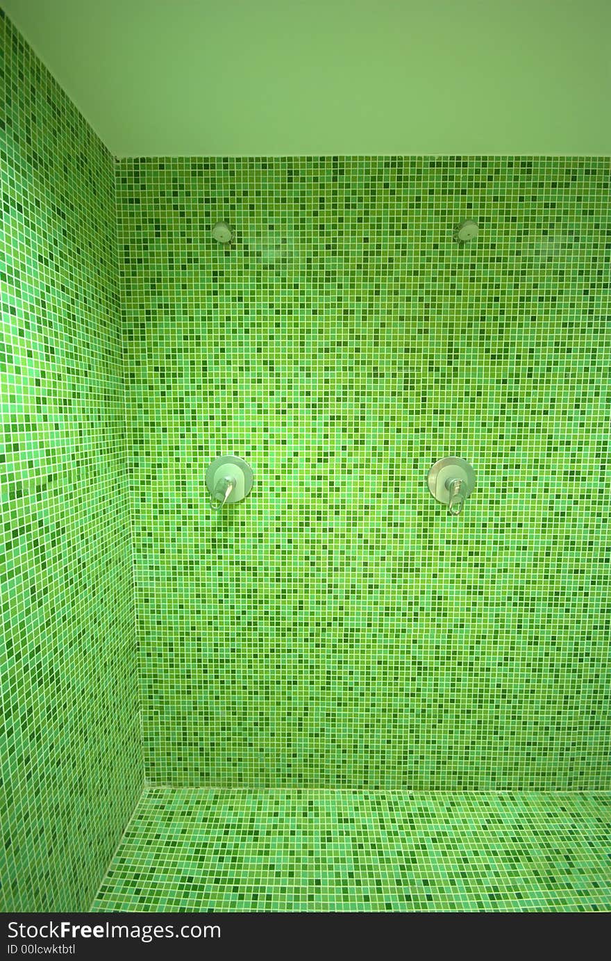 SPA Elegantly decorated public toilet in white and green mosaic - Row of showers and sinks in the sports club bathroom. SPA Elegantly decorated public toilet in white and green mosaic - Row of showers and sinks in the sports club bathroom.