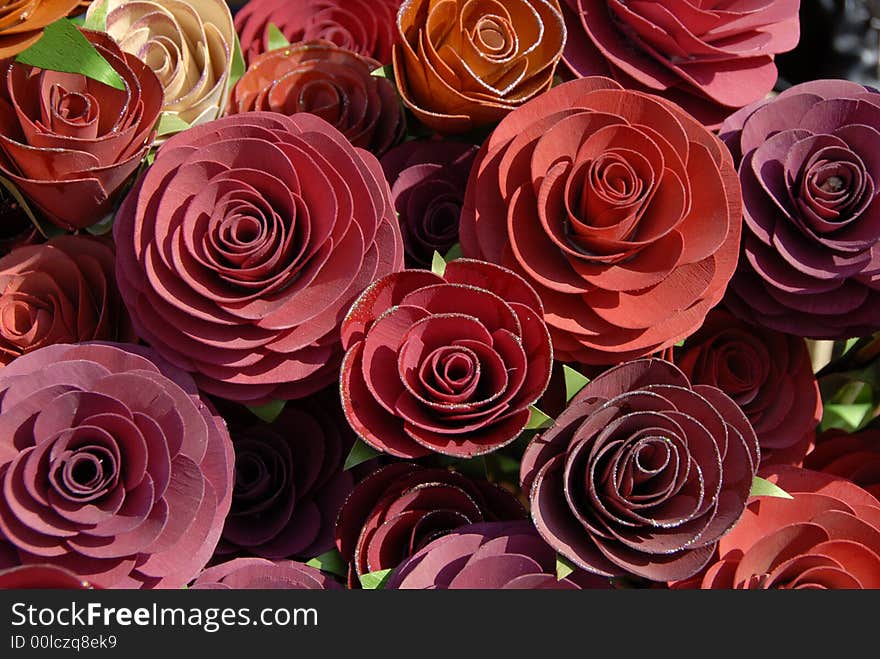 Red and dark red closed-up artificial roses