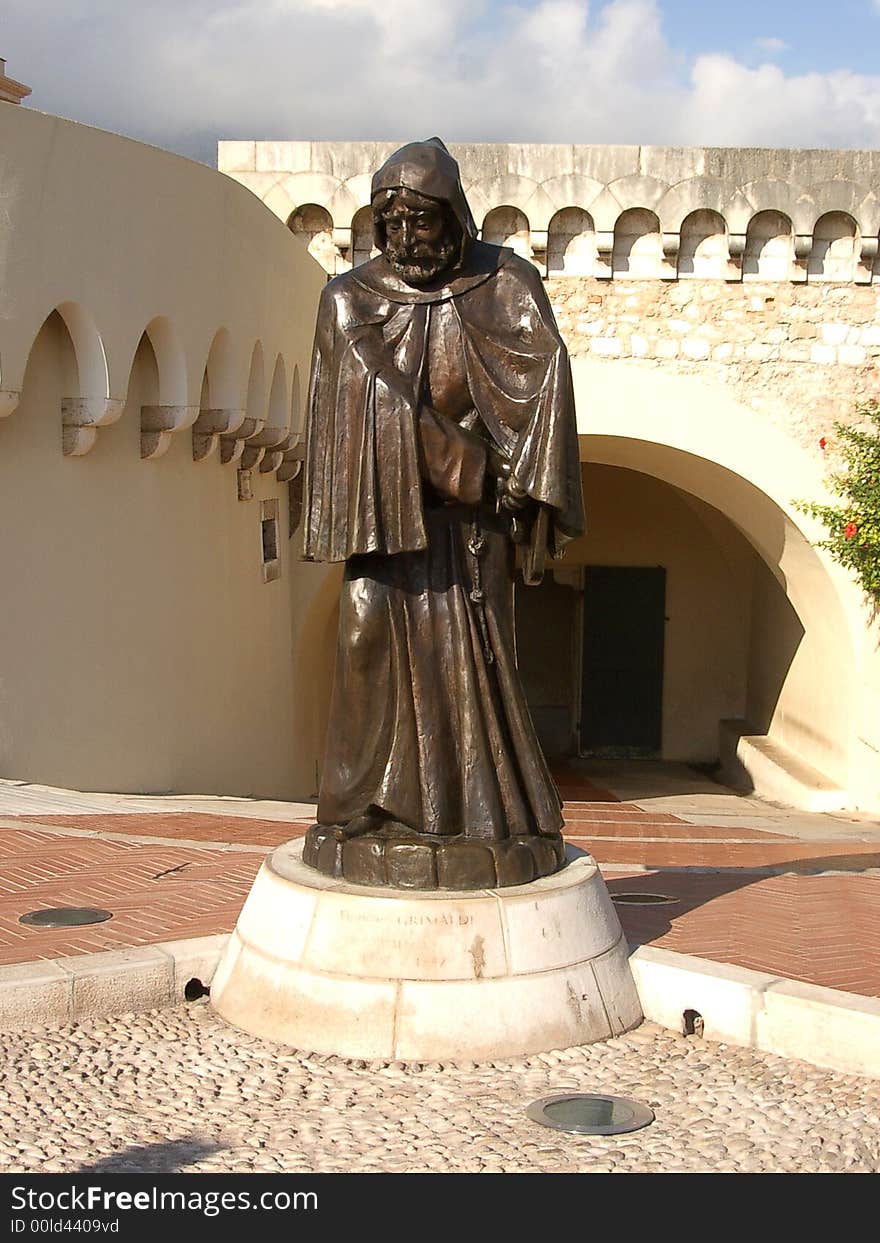 Statue of Francois Grimaldi, monk founder of Grimaldi's dynasty in 1297 took the fortress with a subterfuge. Statue of Francois Grimaldi, monk founder of Grimaldi's dynasty in 1297 took the fortress with a subterfuge