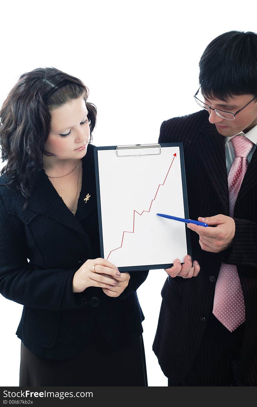 Group of business people working together. Shot in studio. Group of business people working together. Shot in studio.