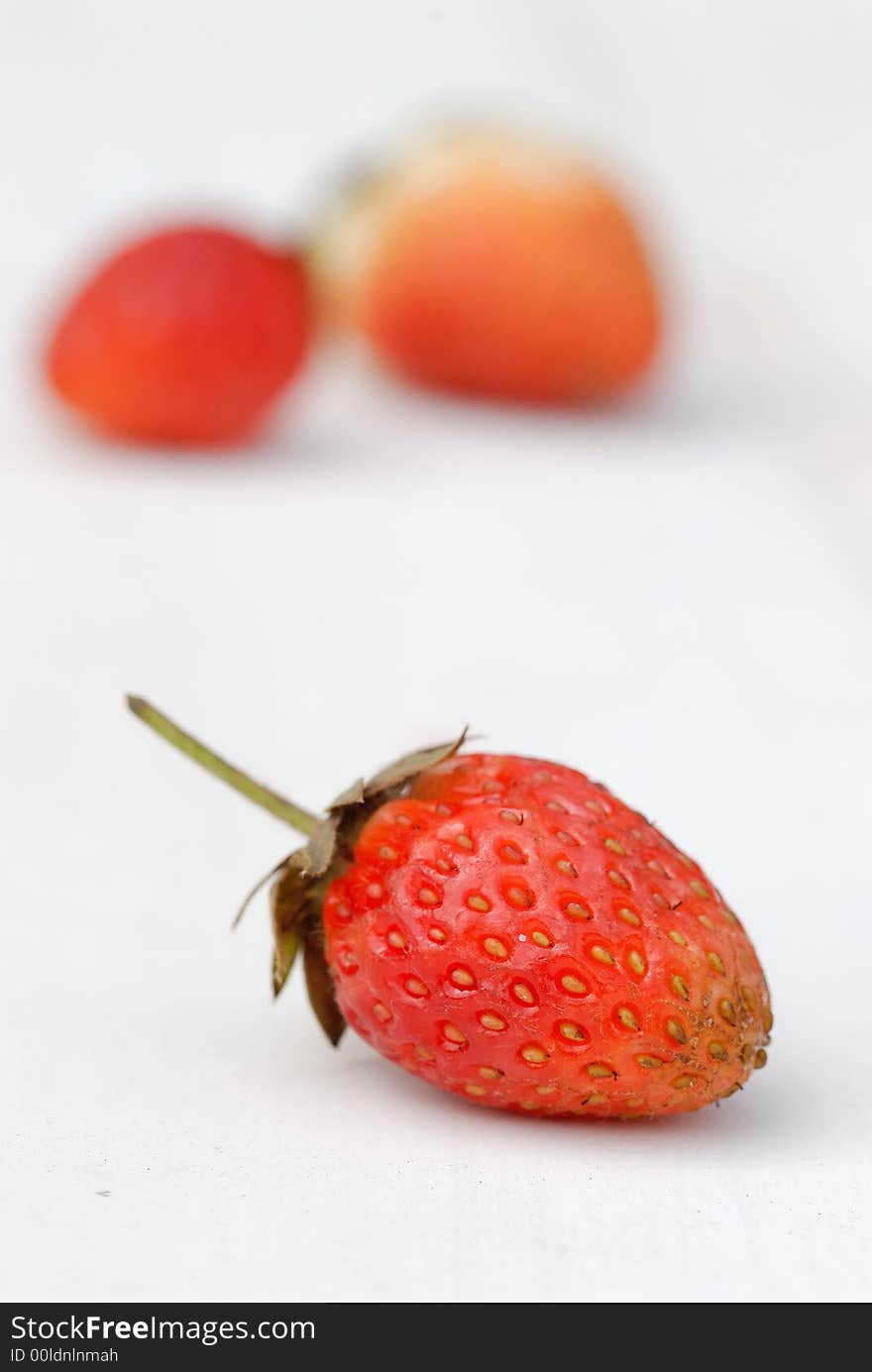 Photography of strawberries on a with background. Photography of strawberries on a with background