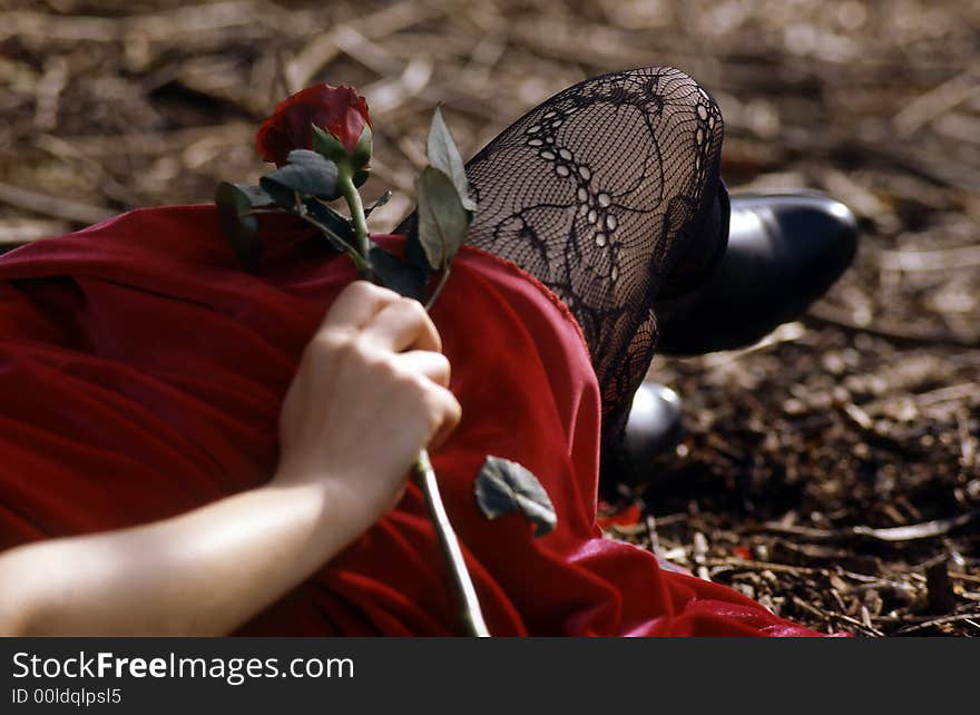 Woman laying in the forest