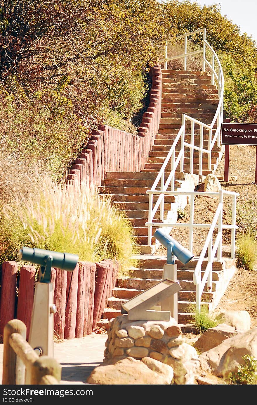 Stairs up a hill near Two Telescopes and No Smoking Sign. Stairs up a hill near Two Telescopes and No Smoking Sign