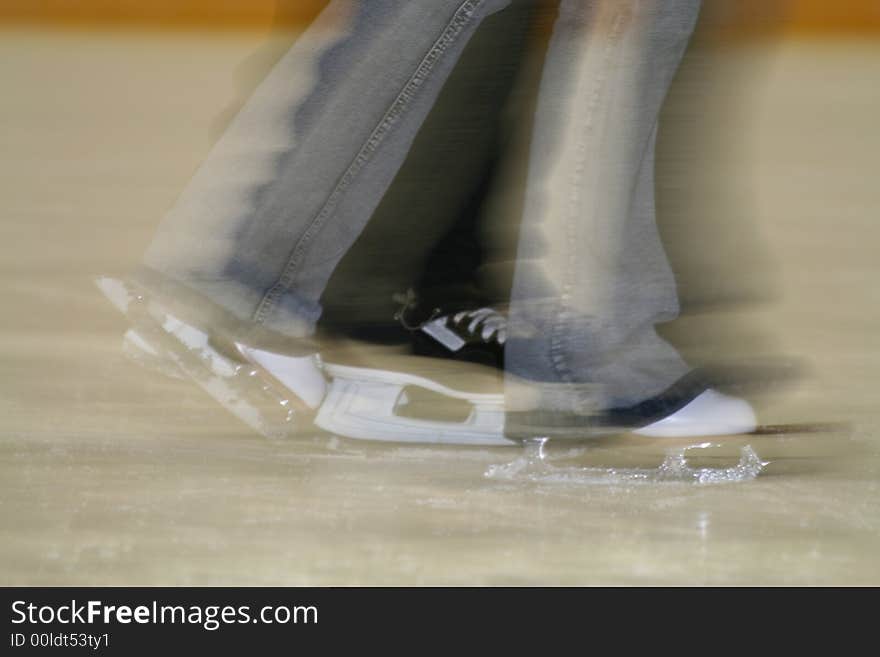 Couple skating on the ice. Couple skating on the ice