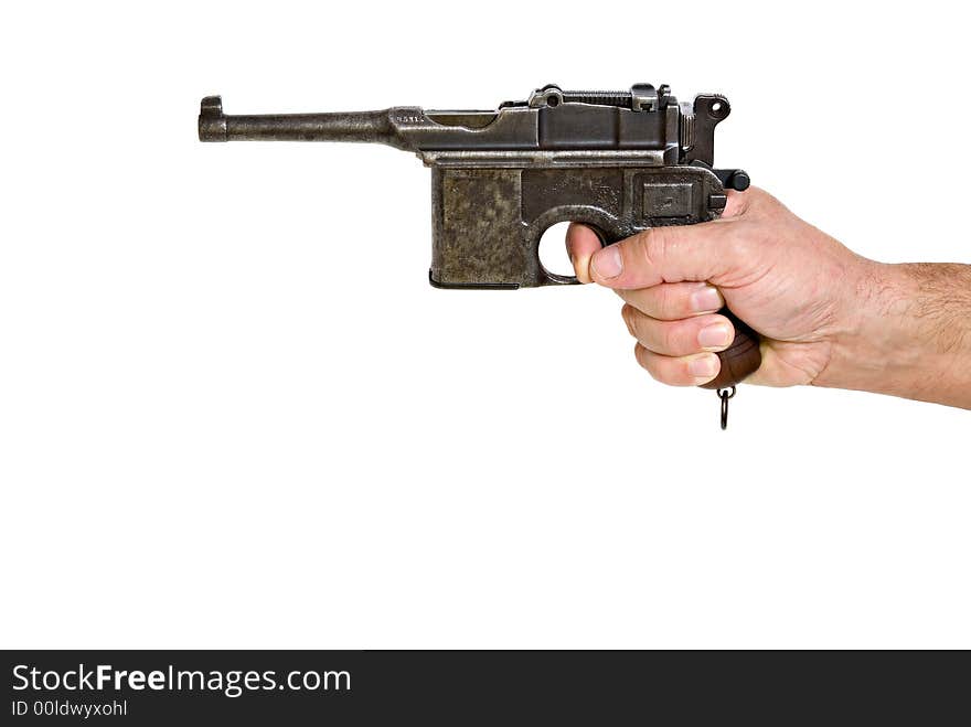 Old Mauser German Pistol in a hand on white background. Old Mauser German Pistol in a hand on white background