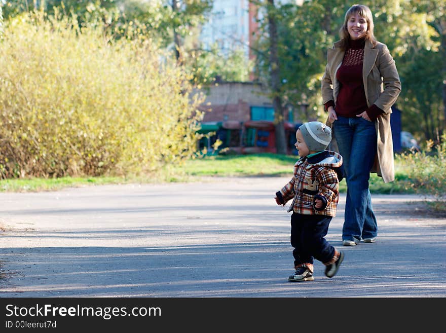 Little boy and his mother in park. Little boy and his mother in park