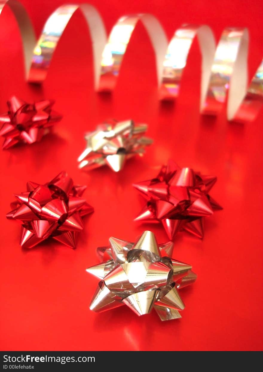 Red and silver celebratory bows. Red and silver celebratory bows