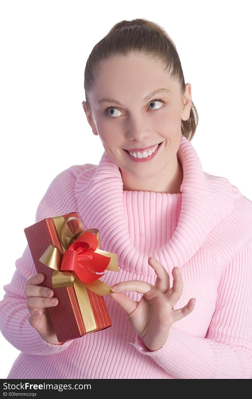 Beautiful young girl in pink holding red gift isolated on white background. Beautiful young girl in pink holding red gift isolated on white background