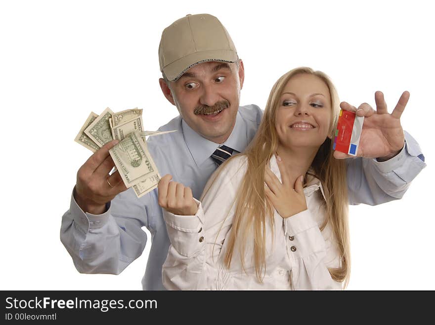 A man in cap with credit cards and money is hugging a smiling woman. A man in cap with credit cards and money is hugging a smiling woman