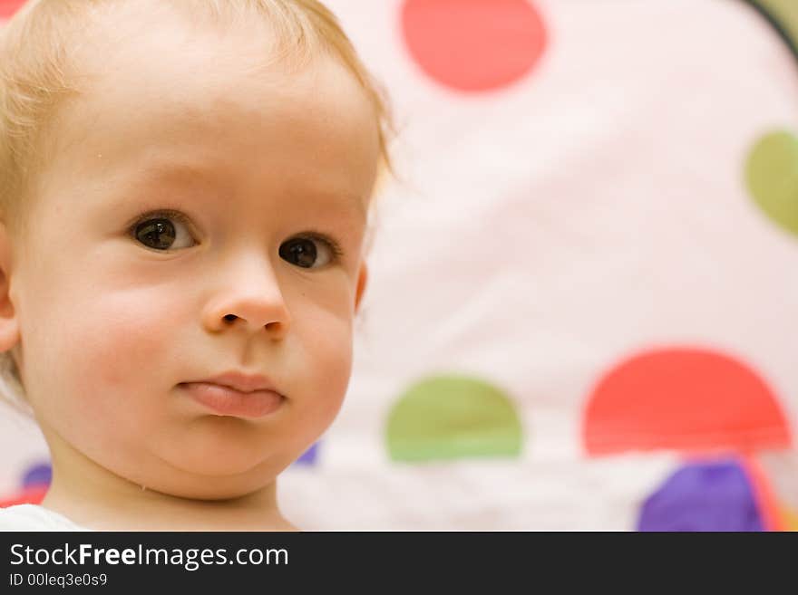 Child boy face 1 year. indoor