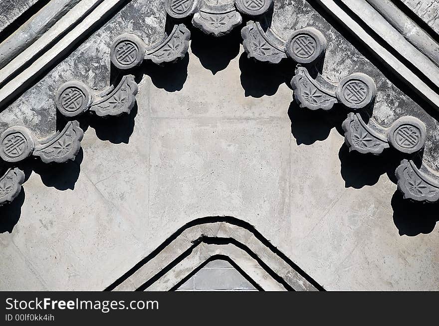 Decoration of the top of a wall, a composition of traditional chinese house. Decoration of the top of a wall, a composition of traditional chinese house.